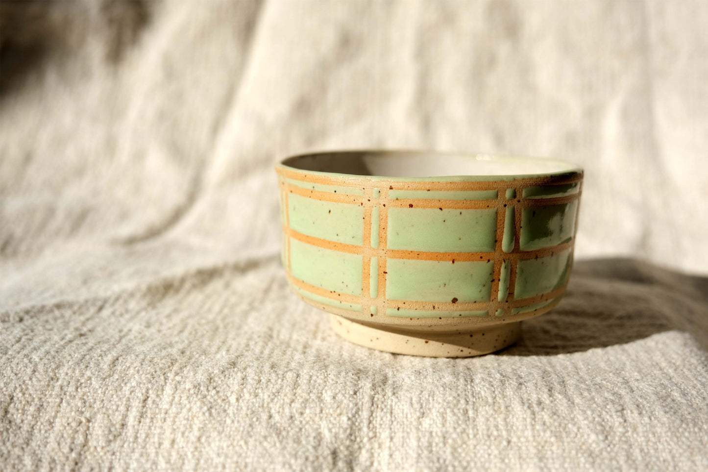 Small Ceramic Bowl with Pastel Green Line Design